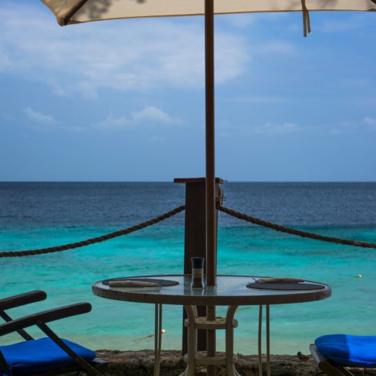 Landscape sea blue beach umbrellas Android SmartPhone Wallpaper